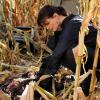BONES:  Brennan (Emily Deschanel) investigates a body found in a cornfield in &quot;The Sin in the Sisterhood&quot; episode of BONES airing Thursday, Feb. 3 (9:00-10:00 PM ET/PT) on FOX.  &#xa9;2011 Fox Broadcasting Co.  Cr:  Ray Mickshaw/FOX