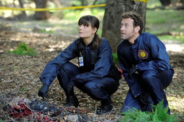 BONES:  Brennan (Emily Deschanel, L), and Hodgins (TJ Thyne, R) investigate the death of a man thought to be killed by a mythical Chupacabra in &quot;The Truth in the Myth&quot; episode of BONES airing Thursday, April 14 (9:00-10:00 PM ET/PT) on FOX.  &#xa9;2011 Fox Broadcasting Co.  Cr:  Ray Mickshaw/FOX