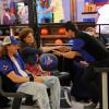 BONES:  Brennan (Emily Deschanel, C) and Booth (David Boreanaz, L) meet bowling team member Hercules Maldonado (guest star Kevin Alejandro, R) when they go undercover at a bowling alley in "The Change in the Game" season finale episode of BONES airing Thursday, May 19 (9:00-10:00 PM ET/PT) on FOX.  ©2011 Fox Broadcasting Co.  Cr:  Ray Mickshaw/FOX