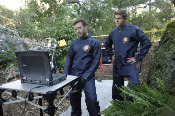 BONES:  Hodgins (TJ Thyne, L) and Jeffersonian intern Wendell Bray (guest star Michael Grant Terry, R) investigate remains found in a paintball field in &quot;The Memories in the Shallow Grave&quot; Season Seven premiere of BONES airing Thursday, Nov. 3 (9:00-10:00 ET/PT) on FOX.  &#xa9;2011 Fox Broadcasting Co. Cr:  Beth Dubber/FOX