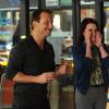 BREAKING IN: Oz (Christian Slater, L) introduces Veronica Mann (Emmy Award-winning actress Megan Mullally, R) to the Contra staff in &quot;The Contra Club&quot; second season premiere episode of BREAKING IN airing Tuesday, March 6 (9:30-10:00 PM ET/PT) on FOX. &#xa9;2012 Fox Broadcasting Co. Cr: Ray Mickshaw/FOX