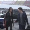 BREAKING IN:  Melanie (Odette Annable, L) and Cameron (Bret Harrison, R) go undercover at a NASCAR race track in the &quot;Need for Speed&quot; episode of BREAKING IN airing Wednesday, April 20 (9:30-10:00 PM ET/PT) on FOX.  &#xa9;2011 Fox Broadcasting Co.  Cr:  Patrick Wymore/FOX