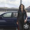BREAKING IN:  Melanie (Odette Annable) goes undercover at a NASCAR race track in the &quot;Need for Speed&quot; episode of BREAKING IN airing Wednesday, April 20 (9:30-10:00 PM ET/PT) on FOX.  &#xa9;2011 Fox Broadcasting Co.  Cr:  Patrick Wymore/FOX