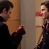 GLEE: Blaine (Darren Criss, R) gives Kurt (Chris Colfer, L) a gift in the &quot;Extraordinary Merry Christmas&quot; episode of GLEE airing Tuesday, Dec. 13 (8:00-9:00 PM ET/PT) on FOX. &#xa9;2011 Fox Broadcasting Co. Cr: Adam Rose/FOX