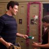 GLEE: Finn (Cory Monteith, L) gives Rachel (Lea Michele, R) a gift in the &quot;Extraordinary Merry Christmas&quot; episode of GLEE airing Tuesday, Dec. 13 (8:00-9:00 PM ET/PT) on FOX. &#xa9;2011 Fox Broadcasting Co. Cr: Adam Rose/FOX