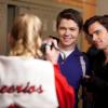 GLEE: Brittany (Heather Morris, L) takes a photo of Rory (Damian McGinty, C) and Blaine's Hollywood big shot brother Cooper (guest star Matt Bomer, R) in &quot;Big Brother,&quot; the Spring Premiere episode of GLEE airing Tuesday, April 10 (8:00-9:00 PM ET/PT) on FOX. &#xa9;2012 Fox Broadcasting Co. Cr: Adam Rose/FOX