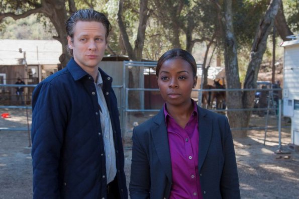 JUSTIFIED -- Peace of Mind -- Episode 12 (Airs Tuesday, March 26, 10:00 pm e/p) -- Pictured: (L-R) Jacob Pitts as Deputy U.S. Marshal Tim Gutterson, Erica Tazel as Deputy U.S. Marshal Rachel Brooks -- CR: Prashant Gupta/FX