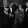 Roger Sterling (John Slattery), Don Draper (Jon Hamm), Joan Harris (Christina Hendricks) and Pete Campbell (Vincent Kartheiser) - Mad Men - Season 6 - Teaser Gallery - Photo Credit: Frank Ockenfels/AMC