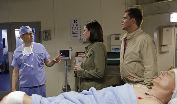 "Stop the Bleeding" -- Gibbs fights for his life aboard a Navy hospital ship after being shot, while DiNozzo and Joanna Teague travel to Shanghai to try and take down the Calling, on the 13th season premiere of NCIS, Tuesday, Sept. 22 (8:00-9:00 PM, ET/PT), on the CBS Television Network. Jon Cryer begins a multi-episode arc as Gibbs\' surgeon, Dr. Cyril Taft. Mimi Rogers returns as CIA Officer Joanna Teague. Pictured left to right: Jon Cryer, Mimi Rogers, Michael Weatherly and Mark Harmon Photo: Sonja Flemming/CBS ÃÂ©2015 CBS Broadcasting, Inc. All Rights Reserved