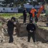 "Hail & Farewell" -- NCIS investigates the murder of a Marine Major believed to have been killed in the 9/11 attack on the Pentagon after human remains are discovered at a construction site. A personal history with the victim drives Gibbs to solve her crime, on NCIS, Tuesday, April 16 (8:00-9:00 PM, ET/PT) on the CBS Television Network. Pictured: Emily Wickersham, Sean Murray, Mark Harmon.  Photo: Sonja Flemming/CBS ÃÂ©2019 CBS Broadcasting, Inc. All Rights Reserved