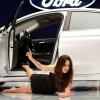 NEW GIRL:  Jess (Zooey Deschanel) fills in for Cece at a car show in the &quot;Models&quot; episode of NEW GIRL airing Tuesday, Oct. 23 (9:00-9:30 PM ET/PT) on FOX. &#xa9;2012 Fox Broadcasting Co.  Cr:  Greg Gayne/FOX