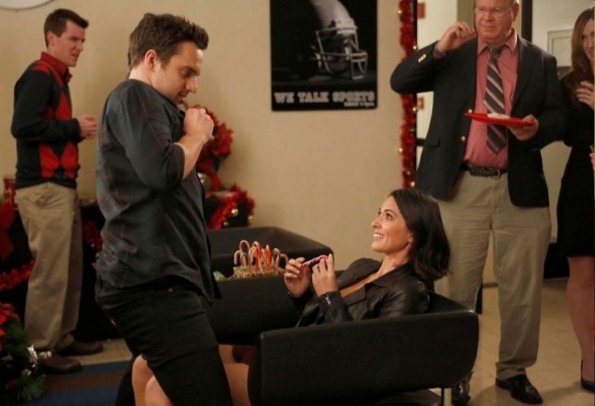 NEW GIRL:  During their night of holiday party-hopping, Nick (Jake Johnson, L) gives Angie (guest star Olivia Munn, R) a lap dance in the &quot;Santa&quot; episode of NEW GIRL airing Tuesday, Dec. 11 (9:00-9:30 PM ET/PT) on FOX. &#xa9;2012 Fox Broadcasting Co.  Cr: Greg Gayne/FOX
