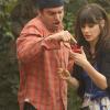 NEW GIRL:  Jess (Zooey Deschanel, R) and Nick (Jake Johnson, L) get an alarming text when they snoop outside the house of one of her students in the "Pepperwood" episode of NEW GIRL airing Tuesday, Jan. 22 (9:00-9:30 PM ET/PT) on FOX.  ©2012 Fox Broadcasting Co.  Cr: Patrick McElhenney/FOX