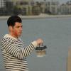 NEW GIRL:  Schmidt (Max Greenfield, L) and Winston (Lamorne Morris, R) head to the beach to put a rare fish back in the ocean in the "Guys Night" episode of NEW GIRL airing Tuesday, March 12 (9:00-9:30 PM ET/PT) on FOX.  ©2013 Fox Broadcasting Co.  Cr:  Ray Mickshaw/FOX