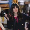 NEW GIRL:  Jess (Zooey Deschanel) helps Nick at the hardware store in the "Guys Night" episode of NEW GIRL airing Tuesday, March 12 (9:00-9:30 PM ET/PT) on FOX.  ©2013 Fox Broadcasting Co.  Cr:  Ray Mickshaw/FOX
