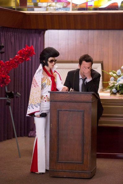 NEW GIRL:  When the gang attends a funeral in Chicago, Jess (Zooey Deschanel, L) steps in, performs as Elvis and comforts Nick (Jake Johnson, R) in the "Chicago" episode of NEW GIRL airing Tuesday, March 26 (9:00-9:30 PM ET/PT) on FOX.  ©2013 Fox Broadcasting Co.  Cr:  Jennifer Clasen/FOX NEW GIRL:  When the gang attends a funeral in Chicago, Jess (Zooey Deschanel, L) steps in, performs as Elvis and comforts Nick (Jake Johnson, R) in the "Chicago" episode of NEW GIRL airing Tuesday, March 26 (9:00-9:30 PM ET/PT) on FOX.  ©2013 Fox Broadcasting Co.  Cr:  Jennifer Clasen/FOX