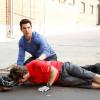 NEW GIRL:  Schmidt (Max Greenfield, R) helps a bike messenger (guest star Derek Waters, L) after an accident in the &quot;The Box&quot; episode of NEW GIRL airing Tuesday, Oct. 15 (9:00-9:30 PM ET/PT) on FOX. &#xa9;2013 Fox Broadcasting Co. Cr: Greg Gayne/FOX