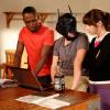 NEW GIRL:  In an effort to change Schmidt's sullen behavior, Jess (Zooey Deschanel, R), Nick (Jake Johnson, C) and Winston (Lamorne Morris, L) resort to writing him letters from his childhood idol  - actor Michael Keaton - in the &quot;Keaton&quot; episode of NEW GIRL airing Tuesday, Oct. 22 (9:00-9:30 PM ET/PT) on FOX. &#xa9;2013 Fox Broadcasting Co. Cr: Greg Gayne/FOX