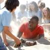 NEW GIRL:  Winston (Lamorne Morris, C) gets burried in the sand by Jess's students in the &quot;Menus&quot; episode of NEW GIRL airing Tuesday, Nov. 12 (9:00-9:30 PM ET/PT) on FOX.  &#xa9;2013 Fox Broadcasting Co.  Cr:  Greg Gayne/FOX