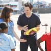 NEW GIRL:  With Nick's (Jake Johnson, second from R) help, Jess (Zooey Deschanel, second from L) finds a way to take her students on a field trip in the &quot;Menus&quot; episode of NEW GIRL airing Tuesday, Nov. 12 (9:00-9:30 PM ET/PT) on FOX.  Also pictured Lamorne Morris, R. &#xa9;2013 Fox Broadcasting Co.  Cr:  Greg Gayne/FOX