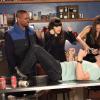 NEW GIRL:  L-R:  Coach (Damon Wayans, Jr.), Jess (Zooey Deschanel) and Cece (Hannah Simone) cheer on Schmidt (Max Greenfield, R) during a round of the &quot;True American&quot; drinking game in the &quot;Mars Landing&quot; episode of NEW GIRL airing Tuesday, March 25 (9:00-9:30 PM ET/PT) on FOX.  &#xa9;2014 Fox Broadcasting Co.  Cr:  Adam Taylor/FOX