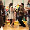 NEW GIRL: Jess (Zooey Deschanel, L) and Nick (Jake Johnson, R) join in the fun at the school dance in the &quot;Dance&quot; episode of NEW GIRL airing Tuesday, April 29 (9:00-9:30 PM ET/PT) on FOX. &#xa9;2014 Fox Broadcasting Co. Cr: Adam Taylor/FOX