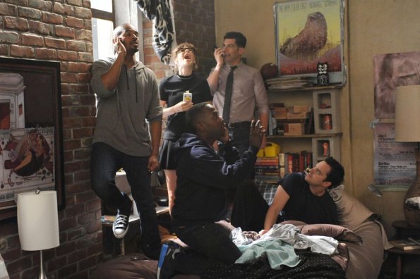 NEW GIRL:  The gang (L-R:  Damon Wayans, Jr., Zooey Deschanel, Lamorne Morris, Max Greenfield and Jake Johnson) is frustrated when only one small spot in the loft has reception for their cell phones in the "Landline" episode of NEW GIRL airing Tuesday, Oct. 14 (9:00-9:30 PM ET/PT) on FOX.  ©2014 Fox Broadcasting Co.  Cr:  Ray Mickshaw/FOX