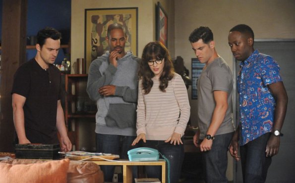 NEW GIRL:  The gang (L-R:  Jake Johnson, Damon Wayans, Jr., Zooey Deschanel, Max Greenfield and Lamorne Morris) admires their new loft phone in the "Landline" episode of NEW GIRL airing Tuesday, Oct. 14 (9:00-9:30 PM ET/PT) on FOX.  ©2014 Fox Broadcasting Co.  Cr:  Ray Mickshaw/FOX