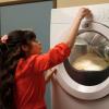 NEW GIRL:  Jess (Zooey Deschanel) tries to defrost the Thanksgiving turkey in the dryer in the "Thanksgiving" episode of NEW GIRL airing Tuesday, Nov. 15 (9:01-9:31 PM ET/PT) on FOX.
©2011 Fox Broadcasting Co.  Cr:  Greg Gayne/FOX