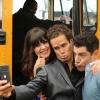 NEW GIRL:  Jess (Zooey Deschanel, L), Schmidt (Max Greenfield, R) and Benjamin (guest star David Neher, C) pose for a picture before they board the party bus for Schmidt's birthday in &quot;The Story of the 50&quot; Winter premiere episode of NEW GIRL, airing Tuesday, Jan. 17 (9:00-9:30 PM ET/PT) on FOX.  &#xa9;2011 Fox Broadcasting Co.  Cr:  Ray Mickshaw/FOX