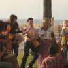 NEW GIRL:  Jess (Zooey Deschanel, fourth from L) and Schmidt (Max Greenfield, fifth from L) join the drum circle at the beach in the "Control" episode of NEW GIRL airing Tuesday, March 13 (9:00-9:30 PM ET/PT) on FOX.   ©2012 Fox Broadcasting Co.  Cr:  Patrick McElhenney/FOX