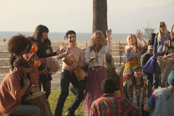 NEW GIRL:  Jess (Zooey Deschanel, fourth from L) and Schmidt (Max Greenfield, fifth from L) join the drum circle at the beach in the "Control" episode of NEW GIRL airing Tuesday, March 13 (9:00-9:30 PM ET/PT) on FOX.   ©2012 Fox Broadcasting Co.  Cr:  Patrick McElhenney/FOX