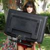 NEW GIRL:  Jess (Zooey Deschanel) takes all her belongings back from her ex-boyfriend in the "Kryptonite" episode of NEW GIRL airing Tuesday, Sept. 27 (9:00-9:30 PM ET/PT) on FOX.  ©2011 Fox Broadcasting Co.  Cr:  Greg Gayne/FOX
