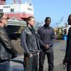 SONS OF ANARCHY -- "Playing with Monsters" -- Episode 703 -- Airs Tuesday, September 23, 10:00 pm e/p) -- Pictured: (L-R) Tommy Flanagan as Filip 'Chibs' Telford, Charlie Hunnam as Jackson "Jax" Teller, Mo McRae as Tyler Yost, Billy Brown as August Marks. CR: Michael Becker/FX